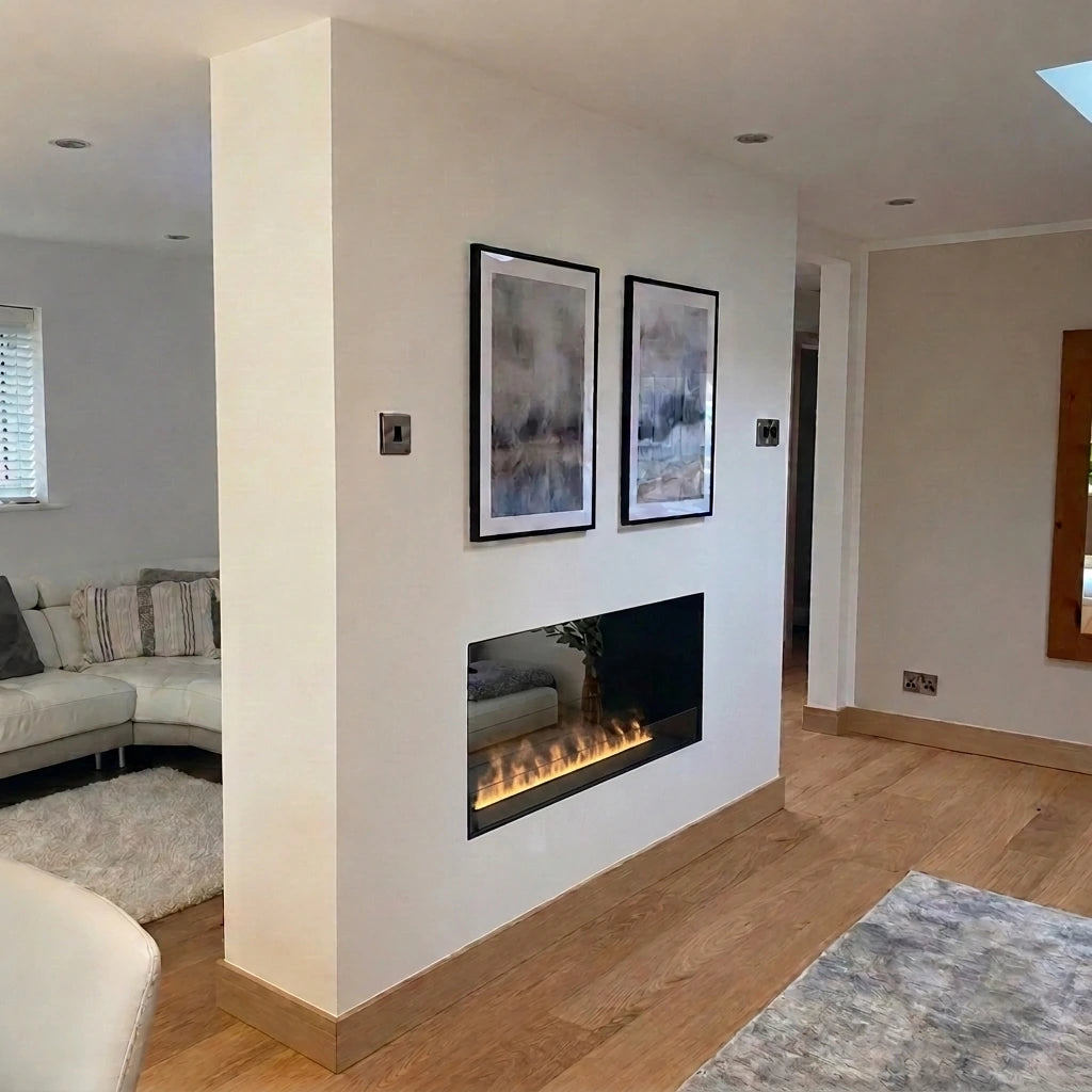 Foco Myst Two 1200 built-in water vapour fireplace with one long water vapour flame as a room divider between living room and hallway