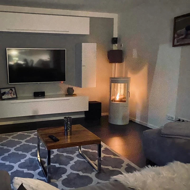 Columbus White Bioethanol Stove with 360-View lit in a real customer's living room
